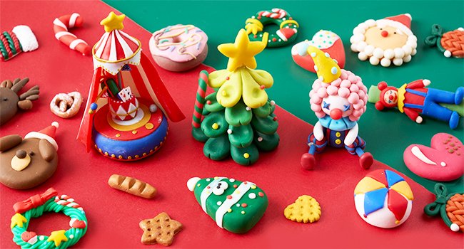 Various polymer clay creations including a circus tent, Christmas tree, clown, Santa, and festive treats arranged on a red and green background.