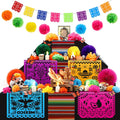 Day of the Dead altar decorations including paper flowers, banners, LED candles, skulls, and butterflies.
