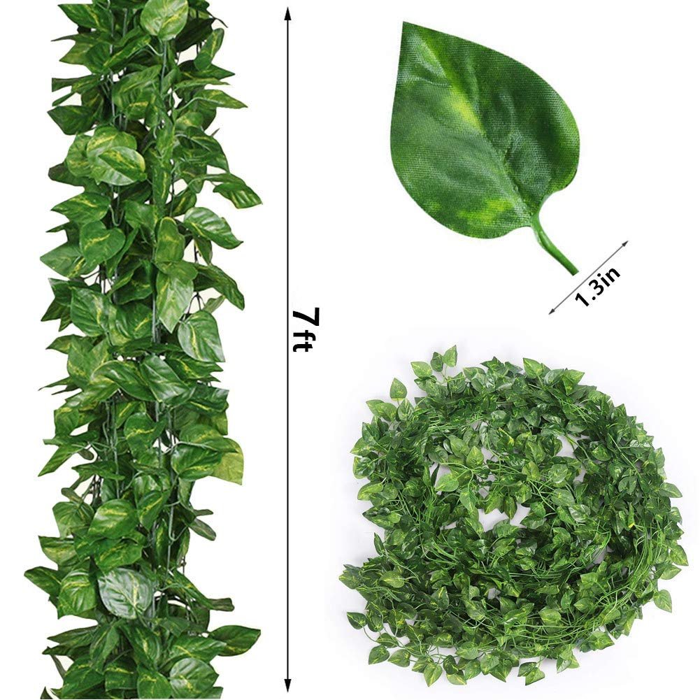 Artificial vine garland with fabric leaves, shown hanging vertically and coiled, with a close-up of a single leaf and its dimensions.