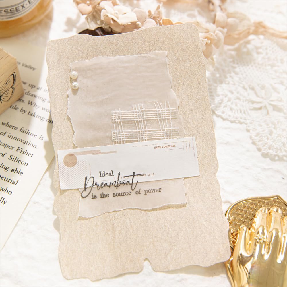 Textured scrapbook paper with torn edges, layered with translucent paper, white stitching, and decorative text elements. A gold hand-shaped embellishment is visible on the right.