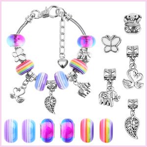 DIY charm bracelet making kit components including snake chains, colorful beads, and various charms like swans, elephants, and butterflies.