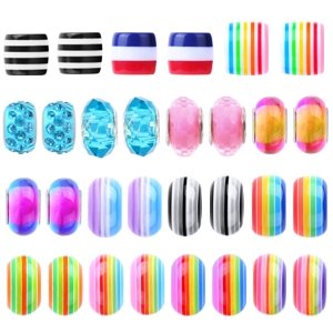 Assortment of colorful beads for jewelry making, including striped, rainbow, and gem-like designs.