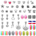 Collection of charms and beads for bracelet making, including animal, food, and inspirational designs.