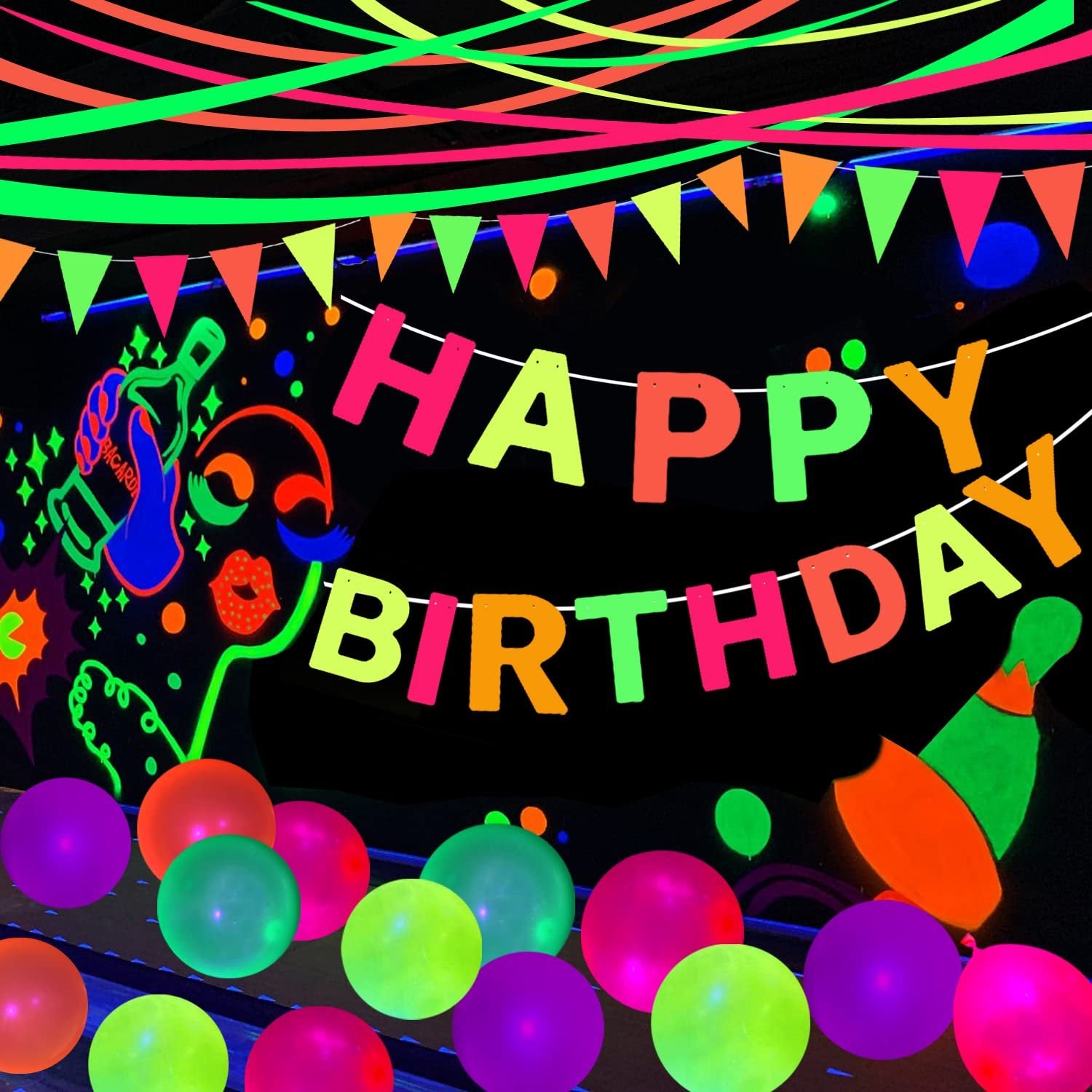 UV-reactive streamers, pennant banner, and balloons for a happy birthday party decoration.