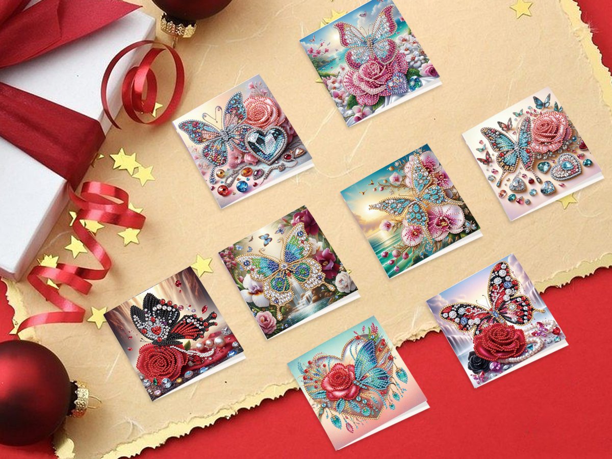 Eight diamond art greeting cards featuring butterflies and roses, arranged on a festive background with gift wrap and ornaments.