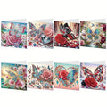 Eight diamond art greeting cards featuring butterflies, roses, and jewels, displayed in a 2x4 grid.