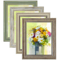 Set of four 8x10 picture frames with different rustic finishes, displayed overlapping on a white background.
