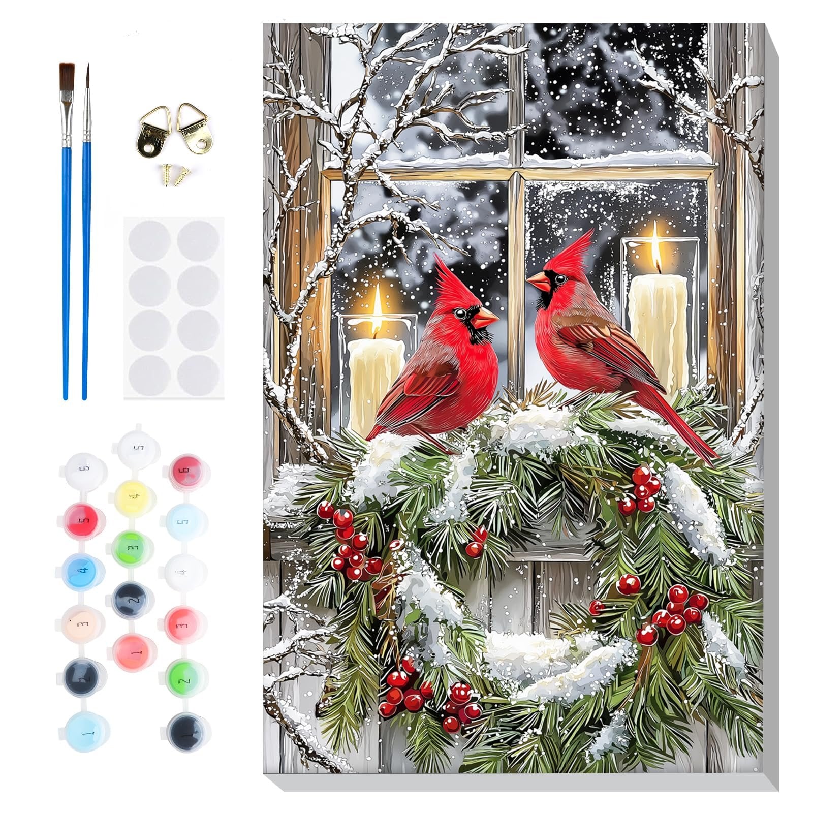 Paint by numbers kit showing two cardinals on a snowy wreath in front of a window with lit candles, includes brushes, paint pots, and hanging hardware.