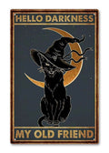 Black cat wearing a witch hat sits in front of a crescent moon with text 'Hello Darkness My Old Friend' above and below.