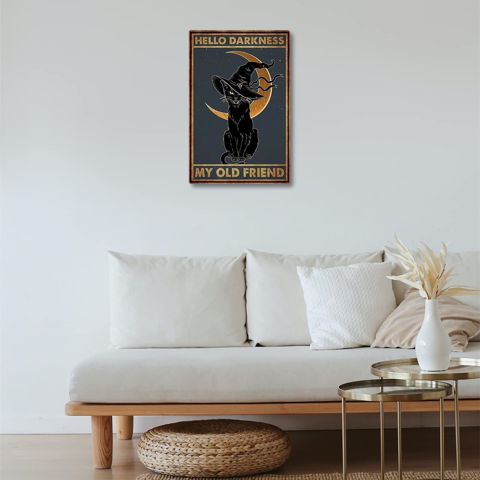 Black cat wearing a witch hat sits on a crescent moon with text 'Hello Darkness My Old Friend' on a metal tin sign.