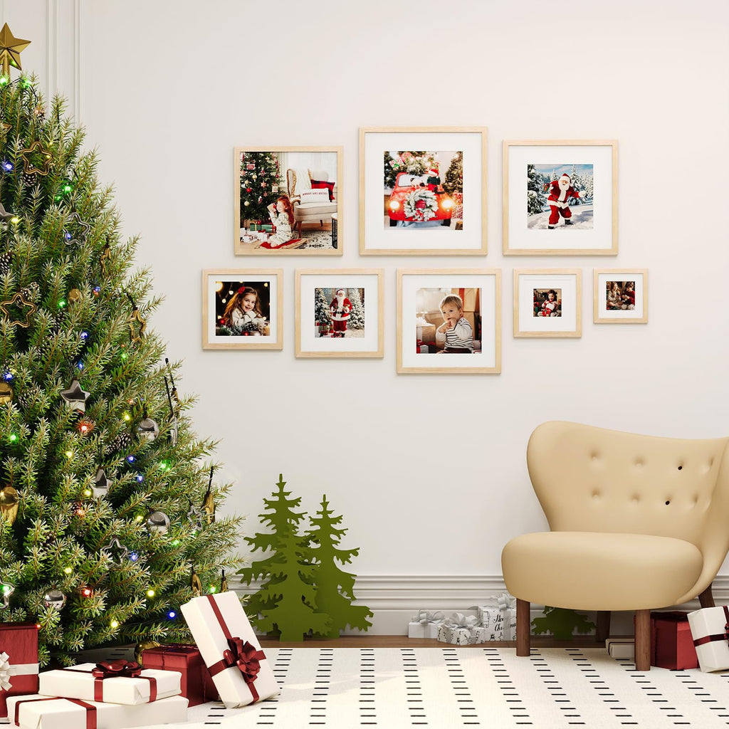 Christmas scene with a decorated tree, gifts, and a gallery wall of framed photos of children and Santa.