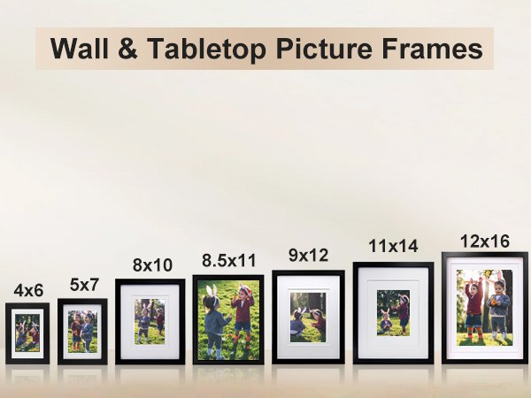 Collection of black picture frames in various sizes displaying photos of children outdoors.