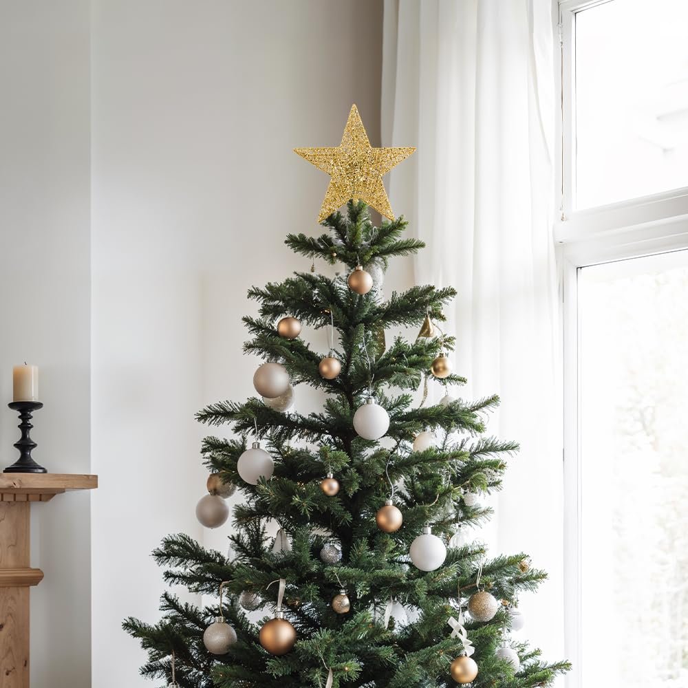Gold glitter 5-point star Christmas tree topper on a decorated evergreen tree with white and gold ornaments.