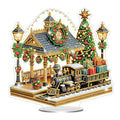 Diamond art painting kit of a Christmas railway station with a train and gifts, featuring a decorated tree and lampposts.