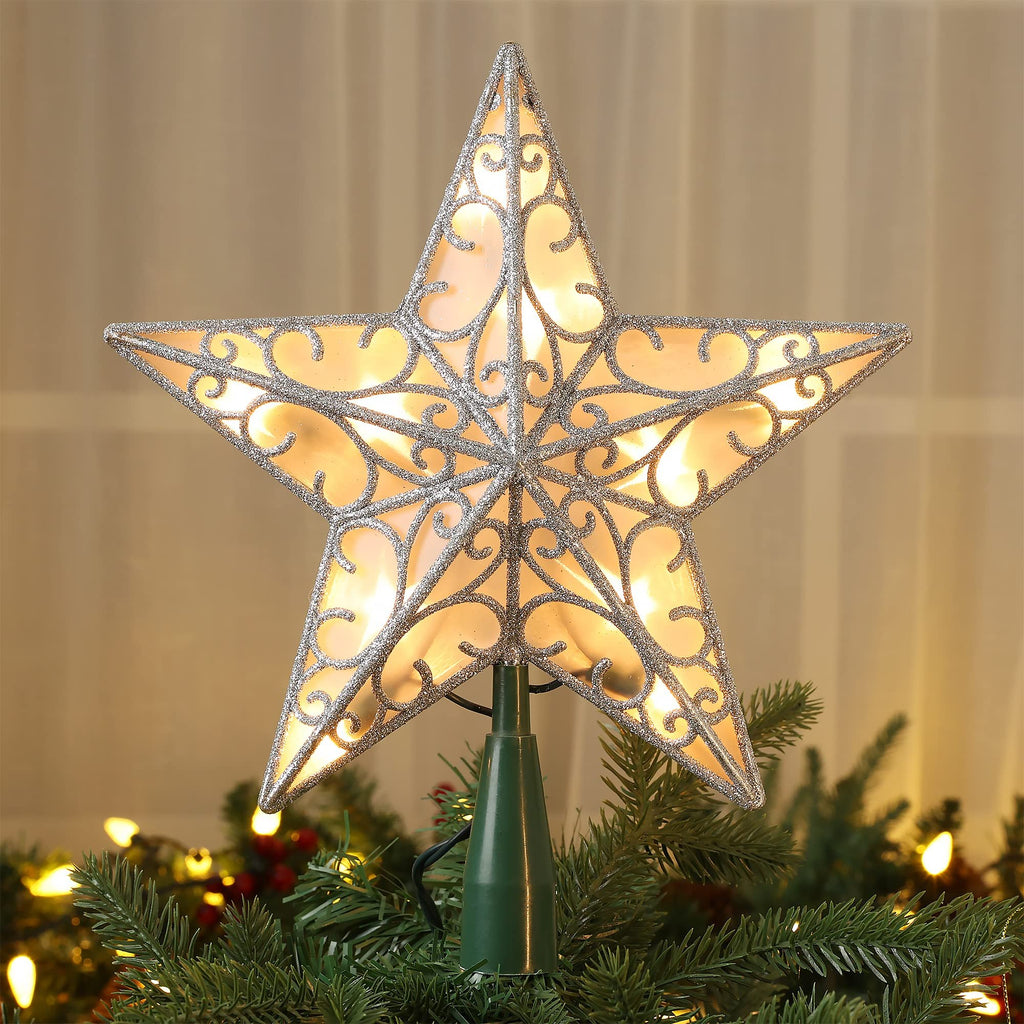 Illuminated 3D star tree topper with silver glitter filigree, placed on a Christmas tree.