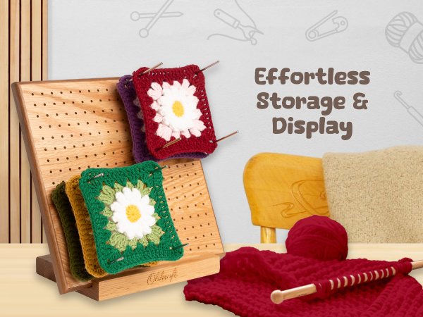 Wooden crochet blocking board with granny squares pinned to it, surrounded by yarn and knitting needles.