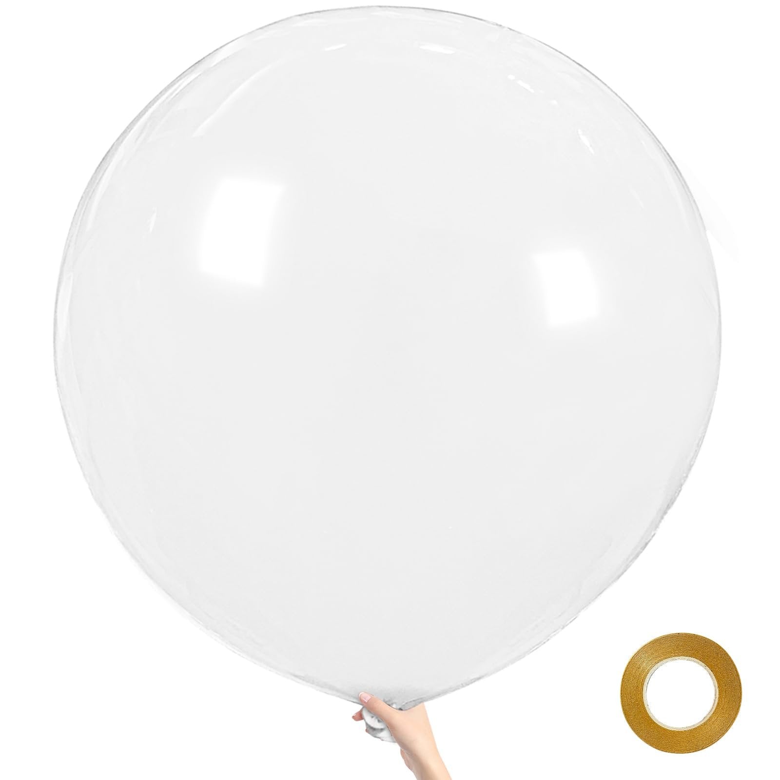 Large clear balloon held by a hand, with a roll of ribbon in the lower right corner.