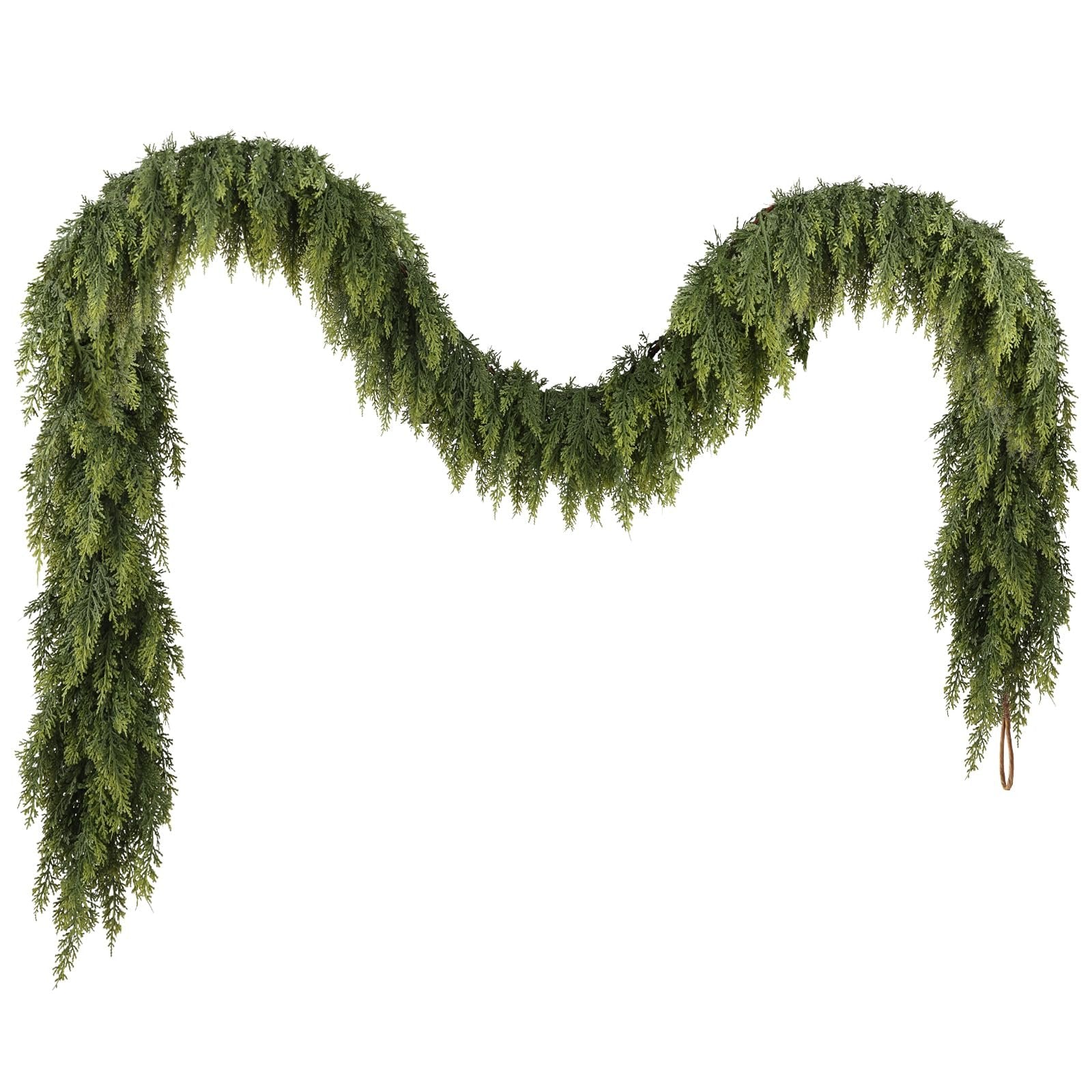 Artificial green cedar garland draped in a curve against a white background, showing realistic foliage and a loop at one end.