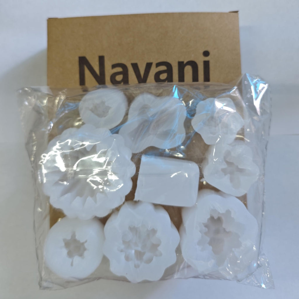 Nine succulent and cactus shaped silicone molds in a clear plastic bag with a cardboard backing.