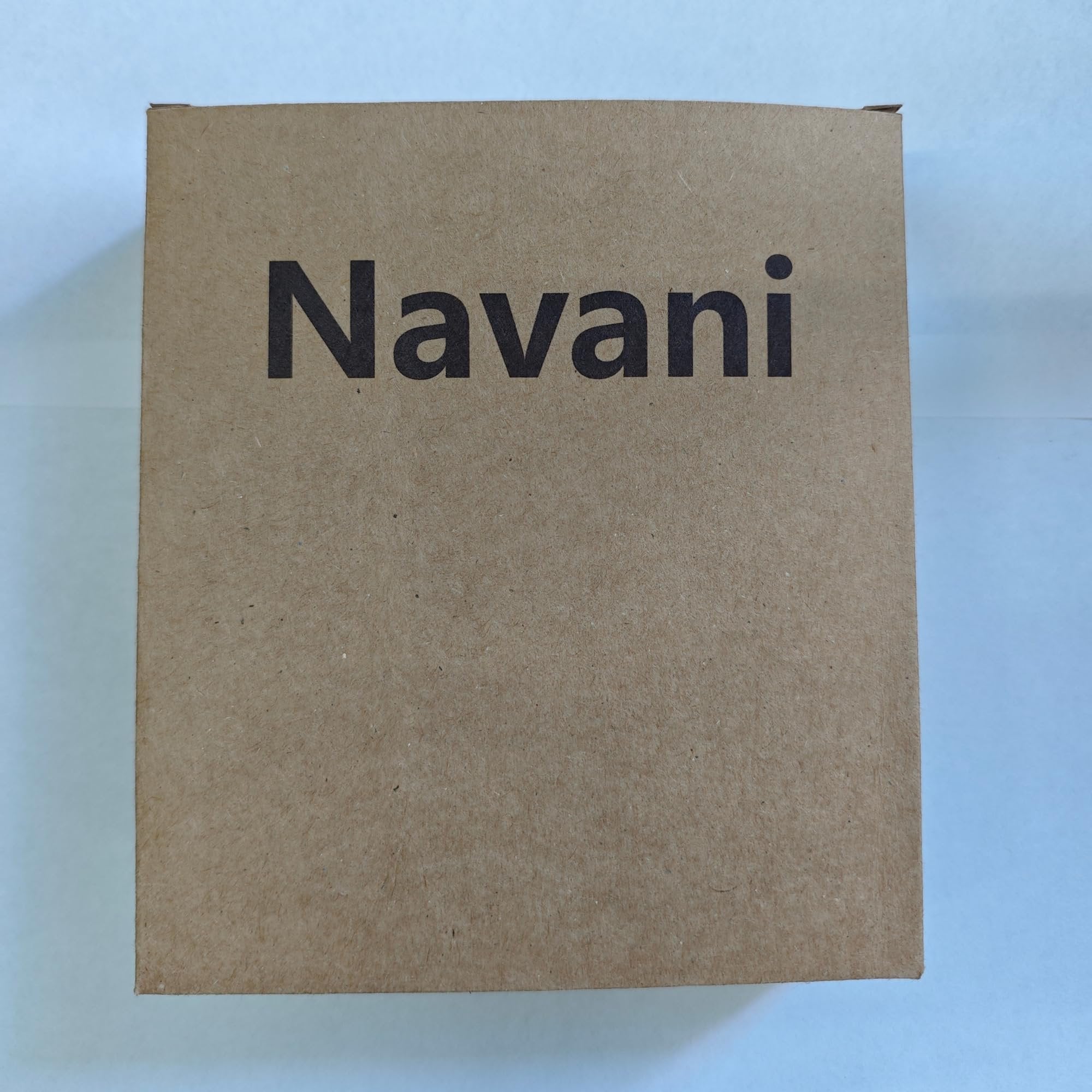 Brown cardboard box with the brand name printed in black on the front.