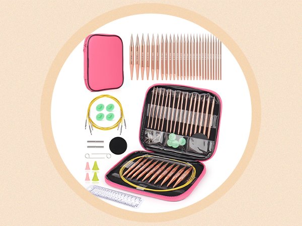 Crochet hook set with pink case, including various sized aluminum hooks, cables, and accessories.