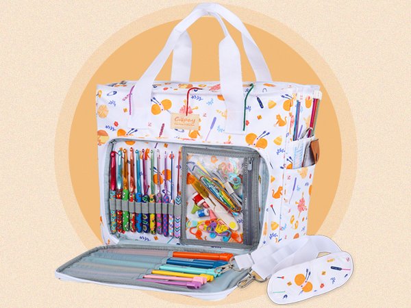 Open crochet hook organizer bag showing various hooks, needles, and accessories inside compartments.