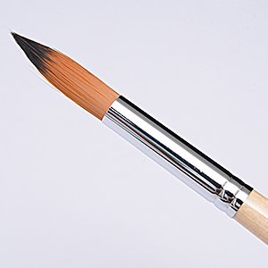 Close-up of a single filbert paint brush with synthetic nylon bristles and a wooden handle.