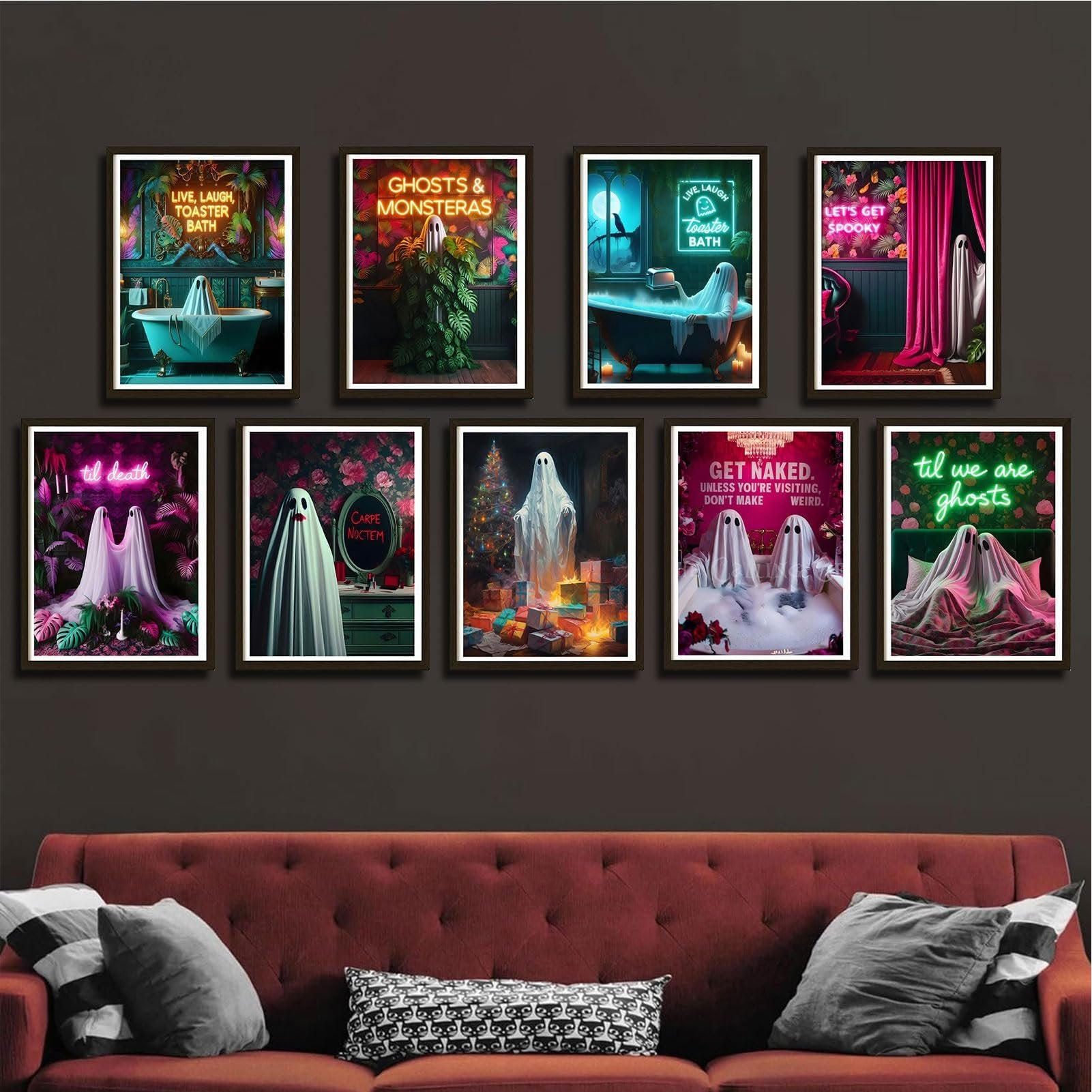 Nine framed Halloween ghost-themed art prints displayed on a wall above a sofa. Prints feature ghosts in various humorous and gothic settings.