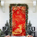 Red glitter fabric Christmas door cover banner with gold snowflakes and a reindeer design, framed by garland and trees.