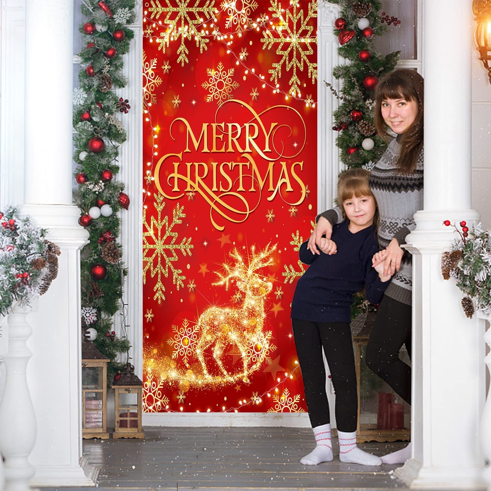 Christmas door cover banner with gold glitter reindeer and snowflakes, featuring 'Merry Christmas' text, displayed on a doorway with a mother and child.