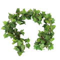 Artificial grape ivy vine garland with green silk leaves and plastic stems, shown against a white background.