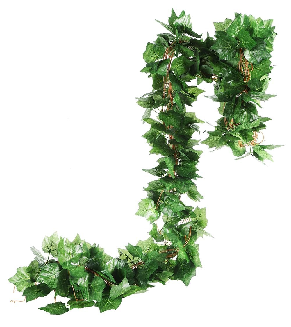 Artificial grape ivy vine garland with green silk leaves and plastic stems on a white background.