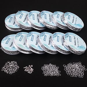 Twelve spools of stainless steel jewelry chain and four piles of jump rings and connectors on a black background.
