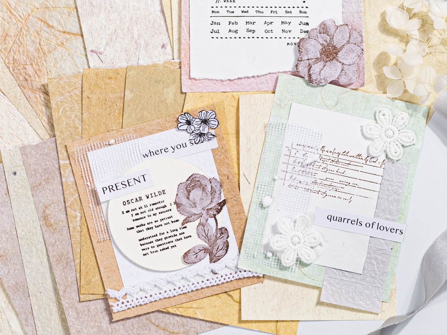 Collage of textured scrapbook paper and mesh fabric with floral embellishments and text.