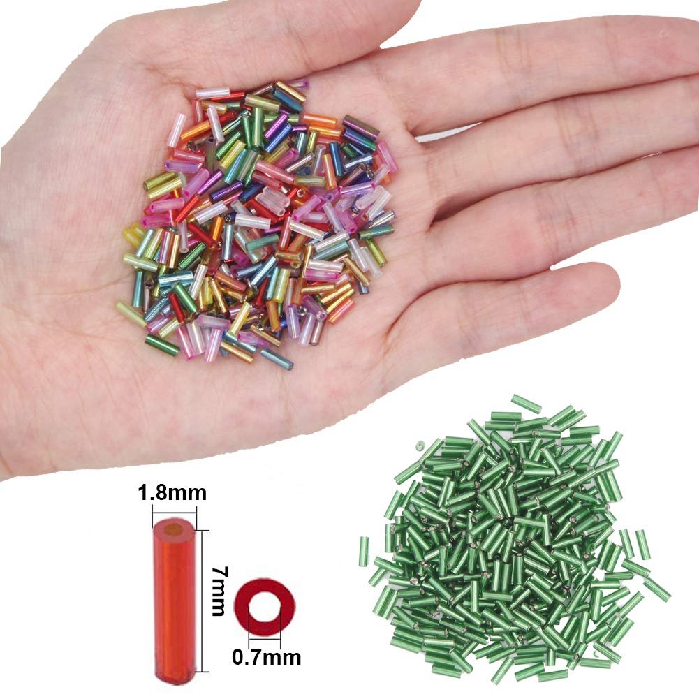 Hand holding colorful bugle seed beads next to a pile of green bugle seed beads with size dimensions shown.