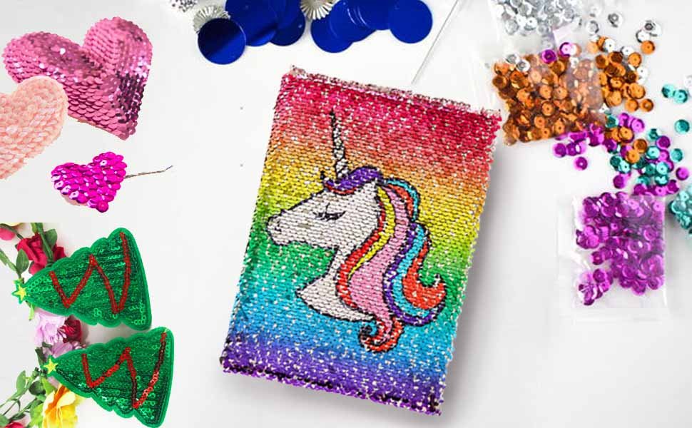 Unicorn sequin art panel and various loose sequins in bags and scattered