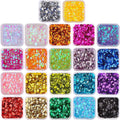 Collection of 22 small plastic containers filled with colorful round cup sequins for crafts.
