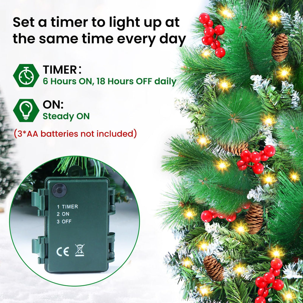 Christmas garland with LED lights and pine cones, showing battery pack with timer settings.