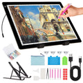 A4 LED light pad with stand, diamond painting kit, and accessories laid out on a white background. A hand is shown using a pink stylus on the light pad.