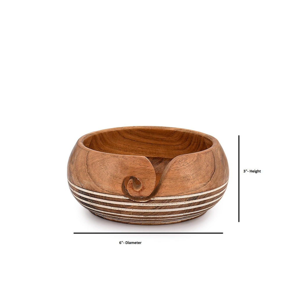 Acacia wood yarn bowl with decorative stripes and a slot for yarn, shown with dimensions indicated.