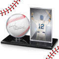 Baseball display case with a baseball and a framed image of a baseball player on a black base, with decorative baseball stitches on the sides.