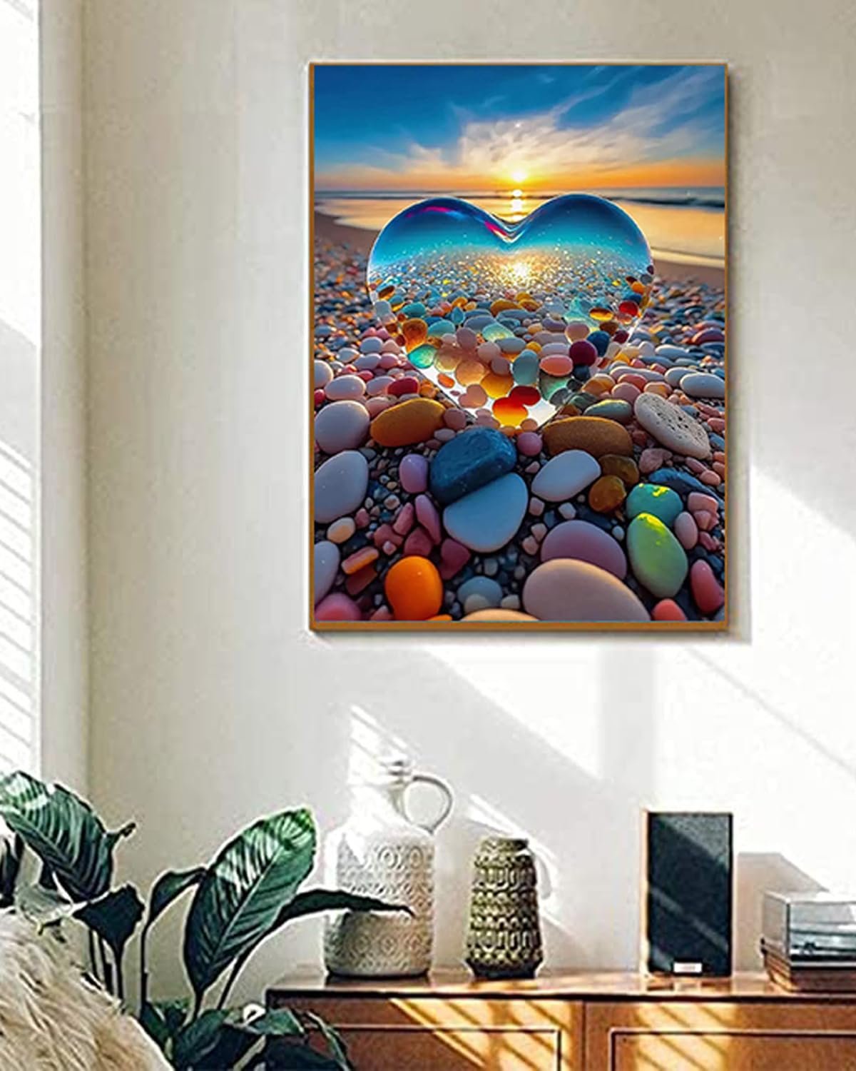 Paint by numbers canvas showing a crystal heart on a beach with colorful pebbles and a sunset.