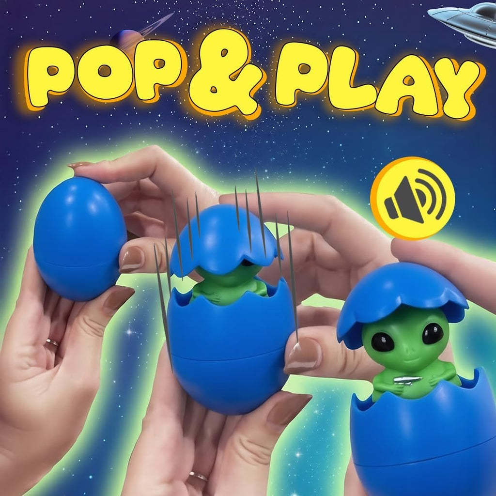 Hands holding blue Easter eggs with green aliens popping out, one egg is closed, one is opening, one is open.