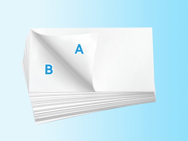 Stack of white release paper sheets with corners peeled back, labeled A and B, on a light blue background.