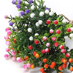 Artificial multicolor flower stems with small buds and green leaves, tied with twine.