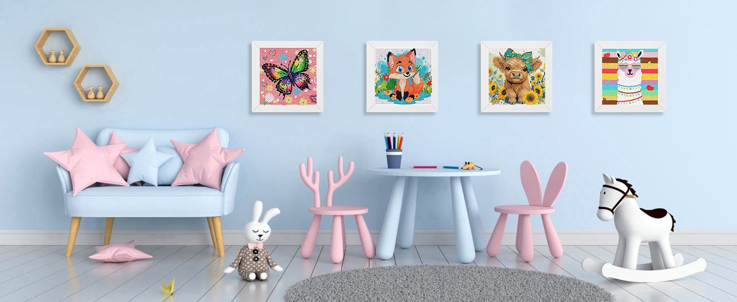 Children's room with four framed diamond art paintings of a butterfly, fox, cow, and llama hanging on the wall.
