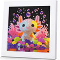Diamond art painting of a colorful axolotl surrounded by coral and bubbles in a white frame.