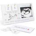 Baby sonogram picture frame with countdown blocks and stork design. Includes loose number tiles and a card.