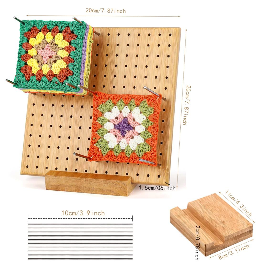 Bamboo crochet blocking board with two crocheted squares attached by stainless steel pegs, showing dimensions.