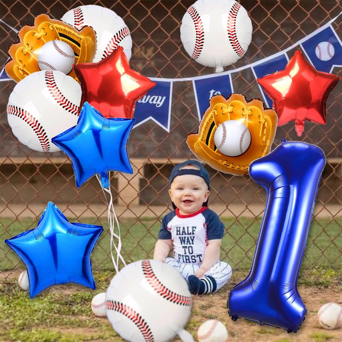 Baby boy in baseball outfit surrounded by baseball-themed balloons and a large blue number 1 balloon.